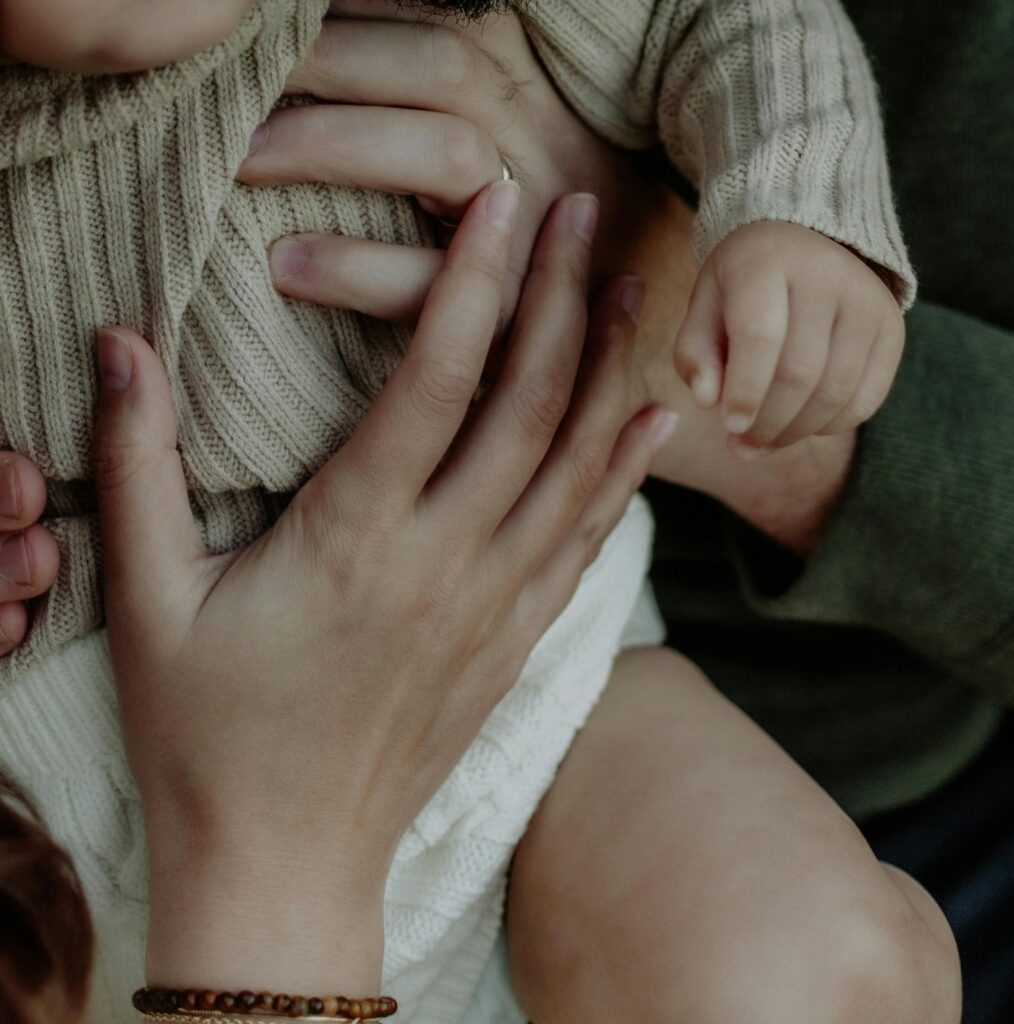 Mommy, daddy, and baby cuddling
Photo by Nelly Aran (https://www.pexels.com/@nati4/)